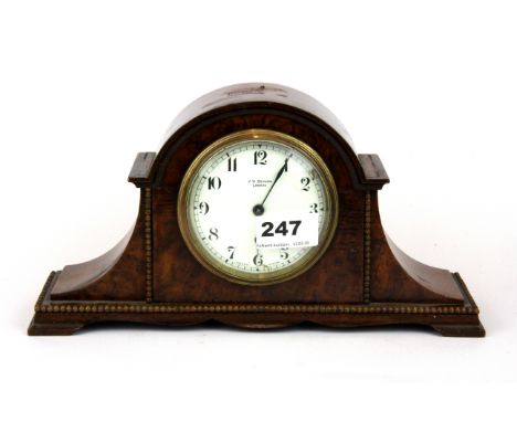 A walnut mantle clock by J.W Benson with buren movement, H. 15cm.