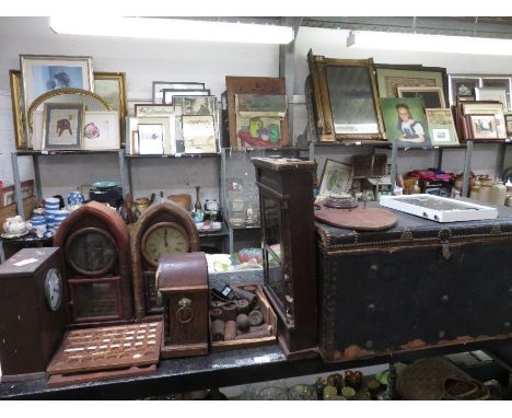 Shelf of items which includes clocks, pendulums, antique trunk containing a large quantity of longcase wooden clock fittings