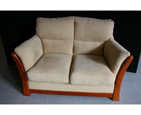 LOVE SEAT SOFA - a cream upholstered love seat sofa.