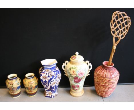 VASES - a collection of 4 vases, a decorative urn and a wicker carpet beater.