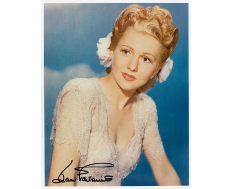 Joan Fontaine signed 10 x 8 colour photo. Gorgeous portrait photo signed by Joan Fontaine.   Good condition.  All items come 