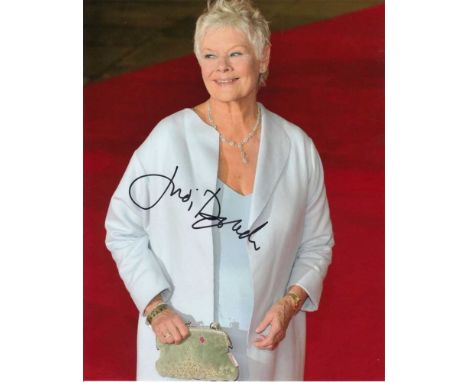 Judi Dench signed 10 x 8 colour photo. Lovely portrait photo of the actress and national treasure.   Good condition.  All ite