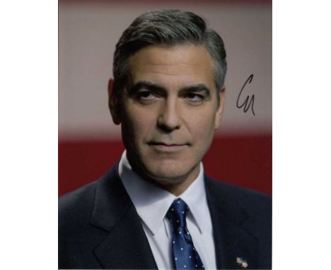 George Clooney signed 10 x 8 colour photo. Lovely head and shoulders portrait of the star of Ocean's Eleven.  Good condition.