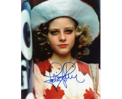 Jodie Foster signed 10 x 8 colour photo. Unusual photo of her in one of her first roles - Martin Scorcese's Taxi Driver.   Go