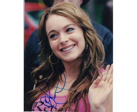 Lyndsay Lohan signed colour 10 x 8 photo. Nice portrait of the actress.   Good condition.  All items come with a Certificate 