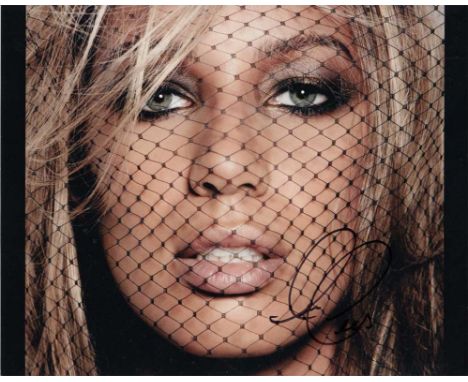 Leona Lewis signed 10 x 8 colour photo. Close up portrait photo of the soul singer and winner of the X Factor.   Good conditi