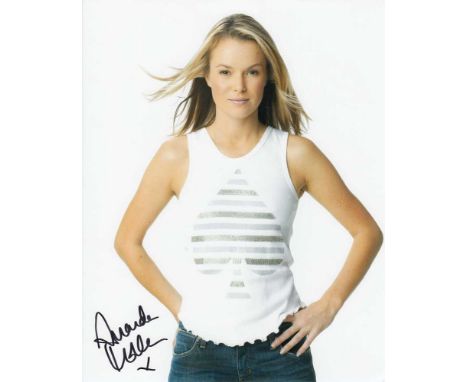 Amanda Holden signed 10 x 8 colour photo. Gorgeous portrait photo of the actress and talent show judge.   Good condition.  Al