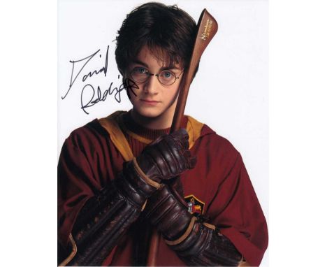Daniel Radcliffe signed 10 x 8 colour photo. Perfect portrait photo of him as Harry Potter seen here in his Quidditch uniform
