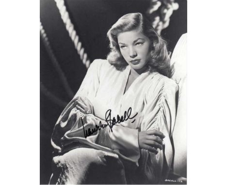 Lauren Bacall signed 10 x 8 black and white photo. glamorous portrait photo of the actress and one time wife of Humphrey Boga