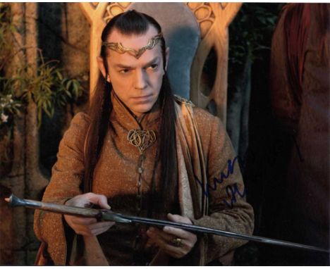 Hugo Weaving signed 10 x 8 colour photo. Excellent shot of him from Lord of the Rings.   Good condition.  All items come with
