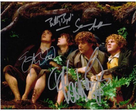 Lord of the Rings cast signed 10 x 8 colour photo. Superb photo from Lord of the Rings signed by Elijah Wood, Sean Astin, Dom