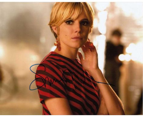 Sienna Miller signed 10 x 8 colour photo. Lovely portrait photo of the actress.   Good condition.  All items come with a Cert