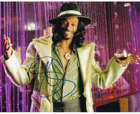 Snoop Dogg signed 10 x 8 colour photo. Brilliant portrait photo of the rapper.   Good condition.  All items come with a Certi