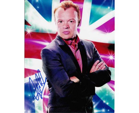 Graham Norton signed 10 x 8 colour photo. Portrait photo of the comedian, presenter and chat show host.   Good condition.  Al