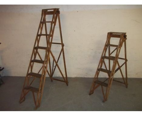 TWO VINTAGE WOODEN STEP LADDERS
