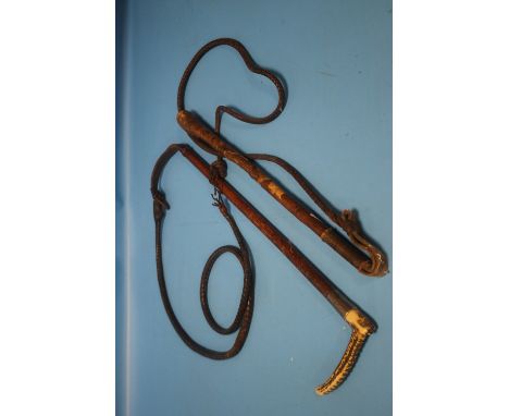 TWO VINTAGE HORSE WHIPS