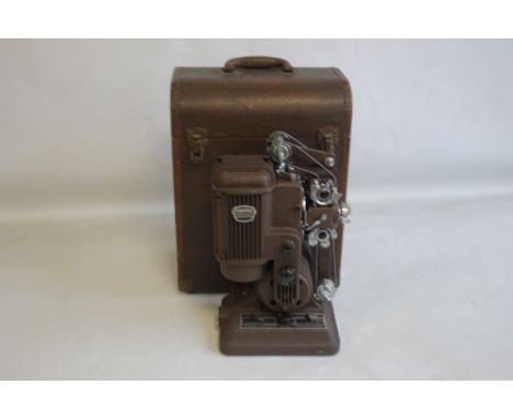 A SIMPLEX AMPRO LTD. IMPERIAL MODEL FILM PROJECTOR, in original fitted carry case, not tested