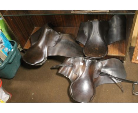 TWO VINTAGE ENGLISH LEATHER SADDLES, ONE A/F, TOGETHER WITH A VINTAGE ENGLISH LEATHER SADDLE WITH STIRRUPS