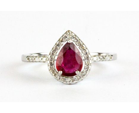 A 925 silver cluster ring set wiith a pear cut ruby and white stones, (P.5).