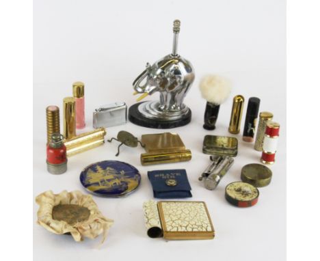 A box of interesting small items including a chromium plated elephant lighter, lighter H. 16cm.