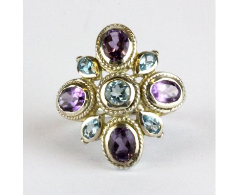 A 925 silver ring set with blue topaz and amethysts, (P).