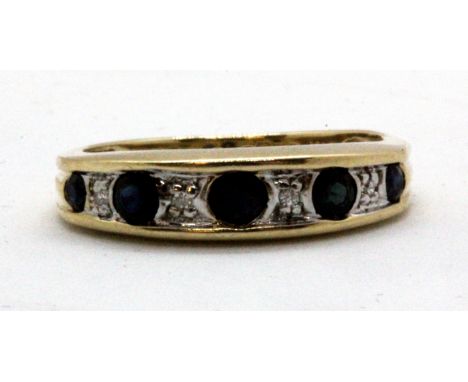 A 9ct yellow gold sapphire and diamond set ring, (I.5).