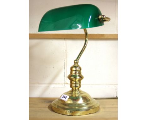 A green glass shade gilt desk lamp.
