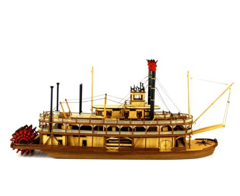A handmade wooden model of a Mississipi river boat, L. 68cm. Prov. Bertie Bardell estate.
