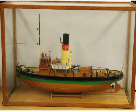 A glass cased handmade wooden model of a tug boat, case 64 x 27 x 50cm. Prov. Bertie Bardell estate.