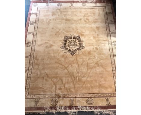 A large Chinese cream ground washed wool carpet, 310 x 230cm.