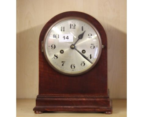 A 1920's mahogany striking mantle clock, H. 28cm.