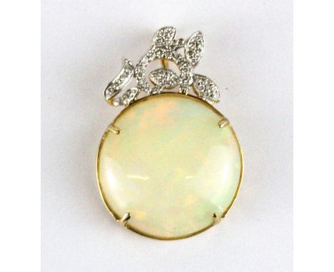 A 14ct yellow gold (stamped 585) pendant set with a large cabochon cut opal and diamonds, opal approx. 19ct, L. 3.5 x 2.3cm.