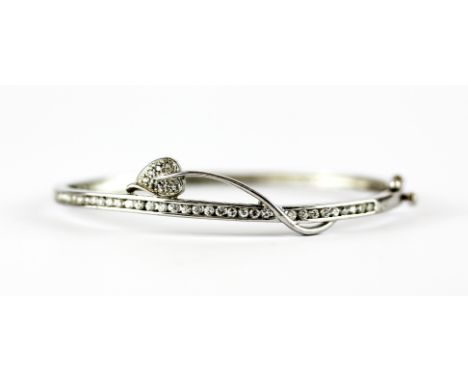 A 925 silver stone set bangle, L. 5.5cm.