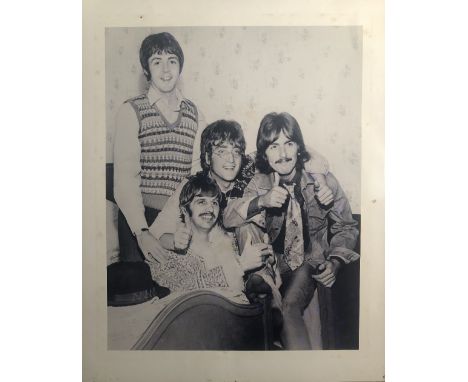 BEATLES PHOTOGRAPH AND NEGATIVE. A large black and white print of an image depicting The Beatles (approx 20 x 24") along with