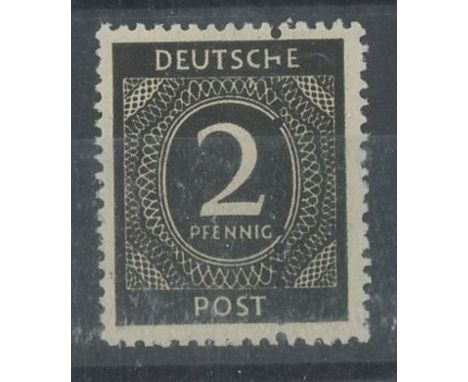 1946 2pf black U/M with extra vertical perforation through centre of the stamp.. SG 900 var.