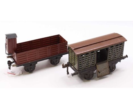 Two Gauge 1 wagons: Marklin open with vigie, appears repainted, brown (VG); with Bing cattle truck, grey, opening doors, brow
