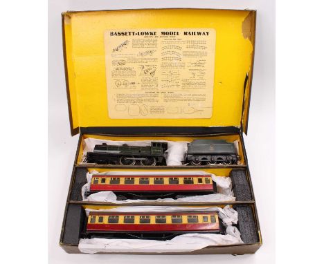 Bassett-Lowke clockwork passenger train set, 4-4-0 ‘Prince Charles’ darker green loco &amp; tender BR lined black &amp; white