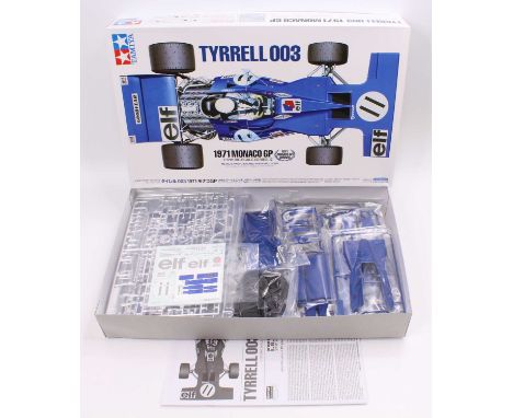 A Tamiya No. 12054 1/12 scale plastic kit for a Tyrrell 003 1971 Monaco Grand Prix F1 race car, as issued, in the original pa