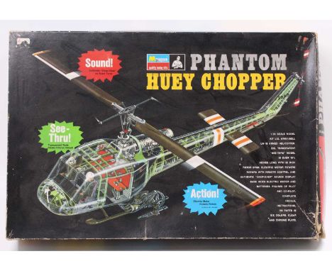 A Monogram 1/24th scale No. PA226 Phantom Huey Chopper model kit, set makes a U.S. Army Bell Helicopter with motorised functi