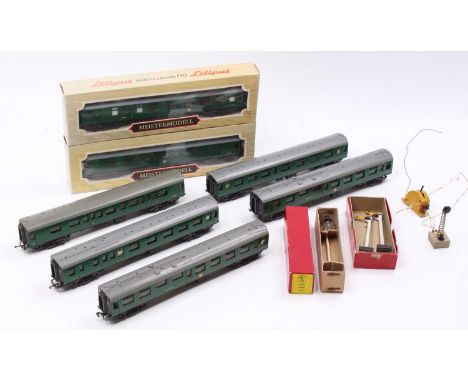 Seven Trix/Lilliput plastic coaches, BR Southern green (E) with a coach lighting kit; yard lamp &amp; two distant signals
