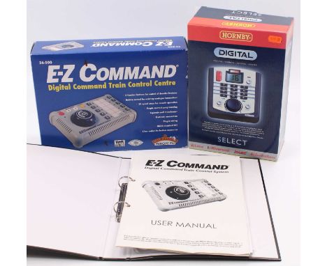 Two Digital Controllers with instructions (in binder): Hornby R8213-11-2365 and Bachmann E-Z Command ref 36-500. Both appear 