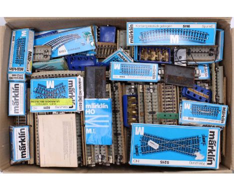 Another two boxes containing a large collection of Marklin 3-rail stud collection track. A very wide and varied assortment. (