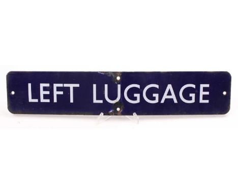 A BR eastern region original blue enamel sign "Left Luggage". sign is bent in the middle and has chipping to face, measures 1