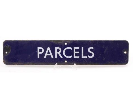 An original British Rail Eastern Region blue enamel sign 'Parcels', some chipping to one of the four fixing holes, and part o