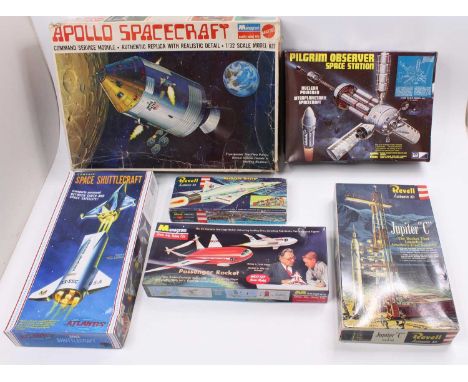 A collection of mixed space-related model kits, with examples including a Monogram 1/32nd scale Apollo Spacecraft, an MPC Pil