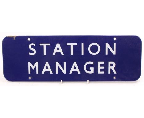 A British Rail Eastern Region flanged enamel sign reading 'Station Manager', with four fixing holes, one chip to the top left