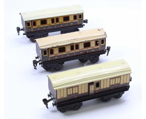 Three bogie coaches LNWR brown &amp; cream by Marklin for Gamages: two all/1st no.2873 &amp; one guard’s brake no.2874. Roofs