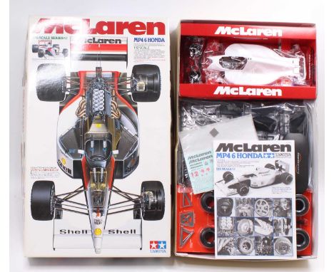 A Tamiya No. 12028 Big Scale Series 1/12 scale plastic kit for a McLaren MP4/6 Honda Formula One race car, as issued in the o