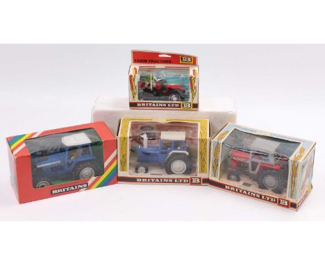 A collection of four various boxed Britains 1/32 scale tractors to include a No. 9522 Massey Ferguson 595, a No. 9523 Ford Tr