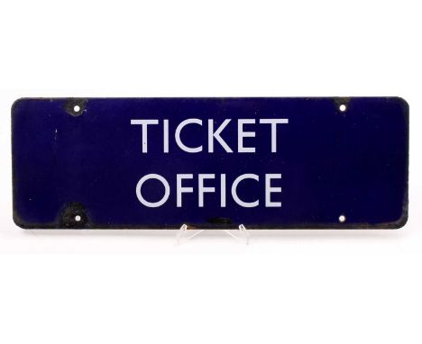 A BR Eastern Region original blue enamel sign "Ticket Office" with four fixing holes. damage around 3/4 fixing holes but over